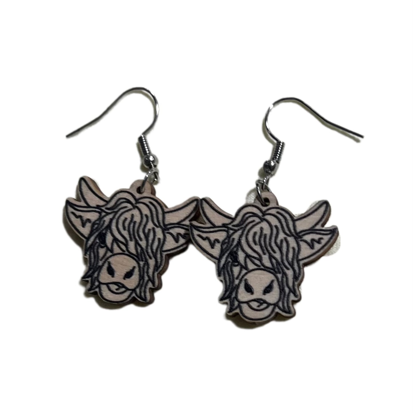 Wooden highland cows