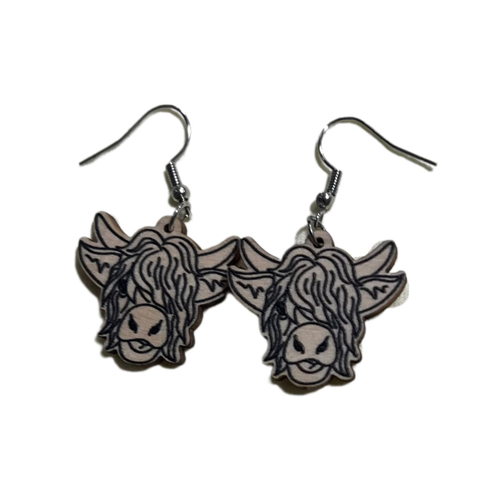 Wooden highland cows